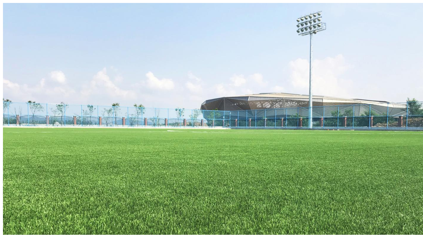 Why do people prefer artificial turf over natural grass?